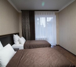 Номер стандарт с 2 односпальными кроватями в Таурух