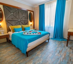 Семейный люкс в Club Big Blue Suit Hotel