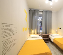 Кровать в общем номере в Арт Хаус