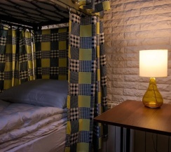 Кровать в общем номере в Good Inn