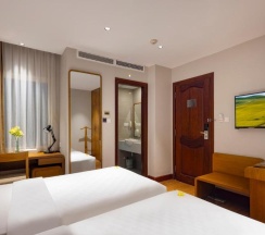 Двухместный номер Deluxe 2 отдельные кровати в Отель Harmony Saigon Hotel & Spa