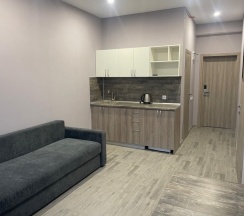 Апартаменты с балконом и с красивым видом из окна в Гостевой дом с Бассейном