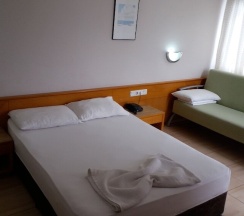 Трёхместный номер Standard в Isinda Hotel