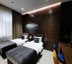 Двухместный номер Deluxe двуспальная кровать в Home Hotel