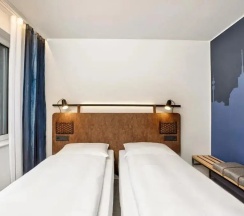 Двухместный номер Comfort 2 отдельные кровати в H2 Hotel München Olympiapark
