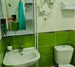 Кровать в общем номере в Камчатдар