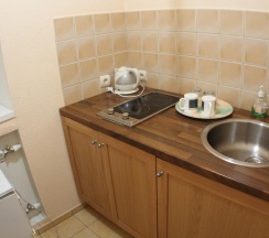Номер улучшенный с 1 двуспальной кроватью в Эккос