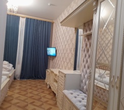 Стандартный четырехместный номер с 2 двуспальными кроватями в За рулем Юг