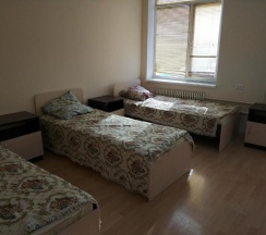 Кровать в общем номере в Әлем