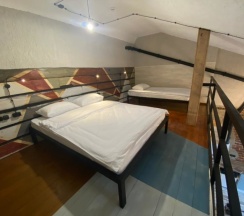 Семейные двухуровневые апартаменты с кухней в Loft Apart