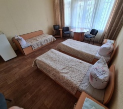 Кровать в общем номере в Волга
