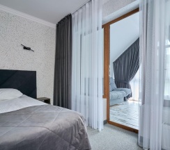 Номер улучшенный комфорт с 1 двуспальной кроватью в Белла