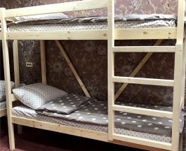 Кровать в 10-ти местном номере в Порт