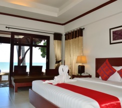 Двухместное бунгало Beachside двуспальная кровать в First Bungalow Beach Resort