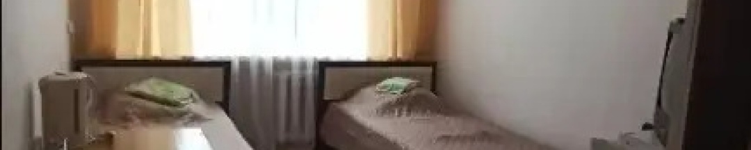 Кровать в общем номере в Север