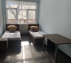 Кровать в общем номере с красивым видом из окна (общая ванная комната) в Свои люди