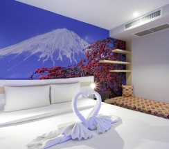 Номер Deluxe с балконом в The AIM Patong Hotel
