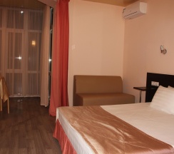 Номер люкс с 1 двуспальной кроватью в Триумф