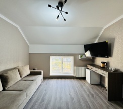 Семейный номер на мансарде в Граф