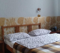 Номер стандарт улучшенный с 1 двуспальной кроватью в Русский лес
