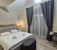 Двухместный полулюкс Мансарда двуспальная кровать в География