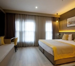 Четырёхместный люкс семейный (пристройка) в Seraglio Hotel & Suites