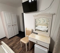 Номер с двуспальной кроватью в Киви