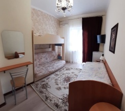 Четырёхместный семейный номер Standard в Марго