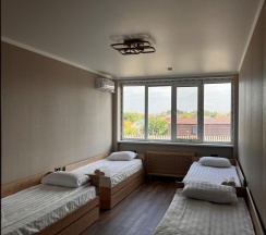 Номер улучшенный семейный в Гостевой дом