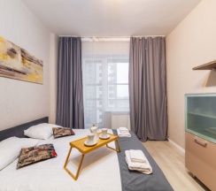 Улучшенная студия с кроватью king size и балконом в Pulkovo Apart