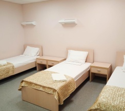 Кровать в 3-местном общем номере в Smart Hotel KDO Тюмень