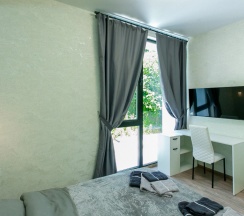 Четырёхместные апартаменты с 3 комнатами с балконом в Валентина