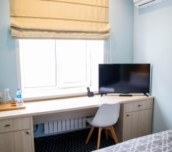 Номер улучшенный стандарт с 1 односпальной кроватью в Хабаровск