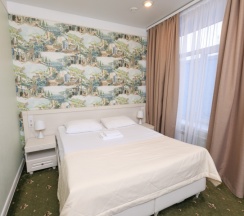 Улучшенный номер с 1 или 2 отдельными кроватями в Аврора