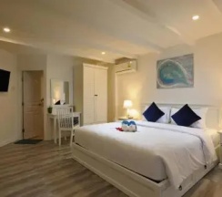 Двухместный номер Deluxe с видом на сад двуспальная кровать в Kata White Villas