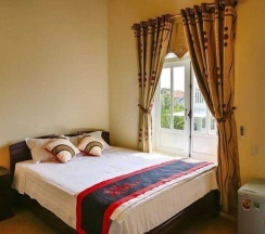 Семейный номер Standard с балконом и с видом на сад в Strawberry Garden Homestay