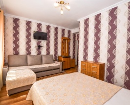 Номер улучшенный семейный в Посейдон