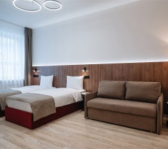 УЛУЧШЕННЫЙ с 1 или 2 кроватями и диваном в Amati Kazan