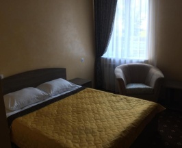 Номер стандарт семейный с 1 двуспальной кроватью в Уют