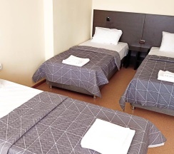 4-местный номер стандарт с 4 односпальными кроватями в Smart Hotel KDO Челябинск