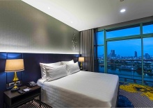 Двухместный номер Deluxe с красивым видом из окна двуспальная кровать в Chatrium Hotel Riverside Bangkok