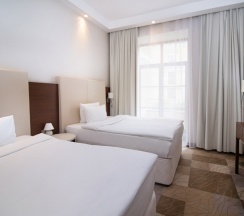 Номер Suite с 2 односпальными кроватями в Новотель Фит Красная Поляна