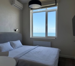 Уютная студия на 13 этаже с панорамным видом на Каспийское море. в Как Дома 05