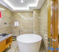 Люкс Deluxe в Zhenhua Xinyue International Hotel