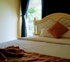 Кровать в общем номере в Mui Ne Alena Bungalow Hotel