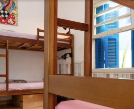 Кровать в общем номере в Paradiso Hostel