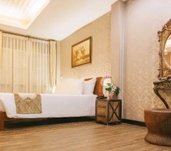 Двухместный полулюкс двуспальная кровать в Chuchai Buri Sri Amphawa