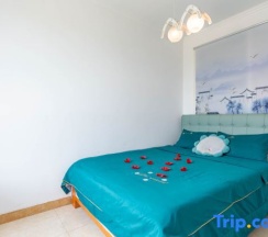 Люкс с 3 комнатами с видом на море в Rizhao Shuohai Seaview Homestay (Wanpingkou Branch)