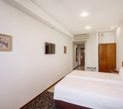 Стандарт Премиум с двумя кроватями/ или одной широкой кроватью в Бенефит Плаза