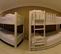 Кровать в общем номере в Bahia Prime Hostel